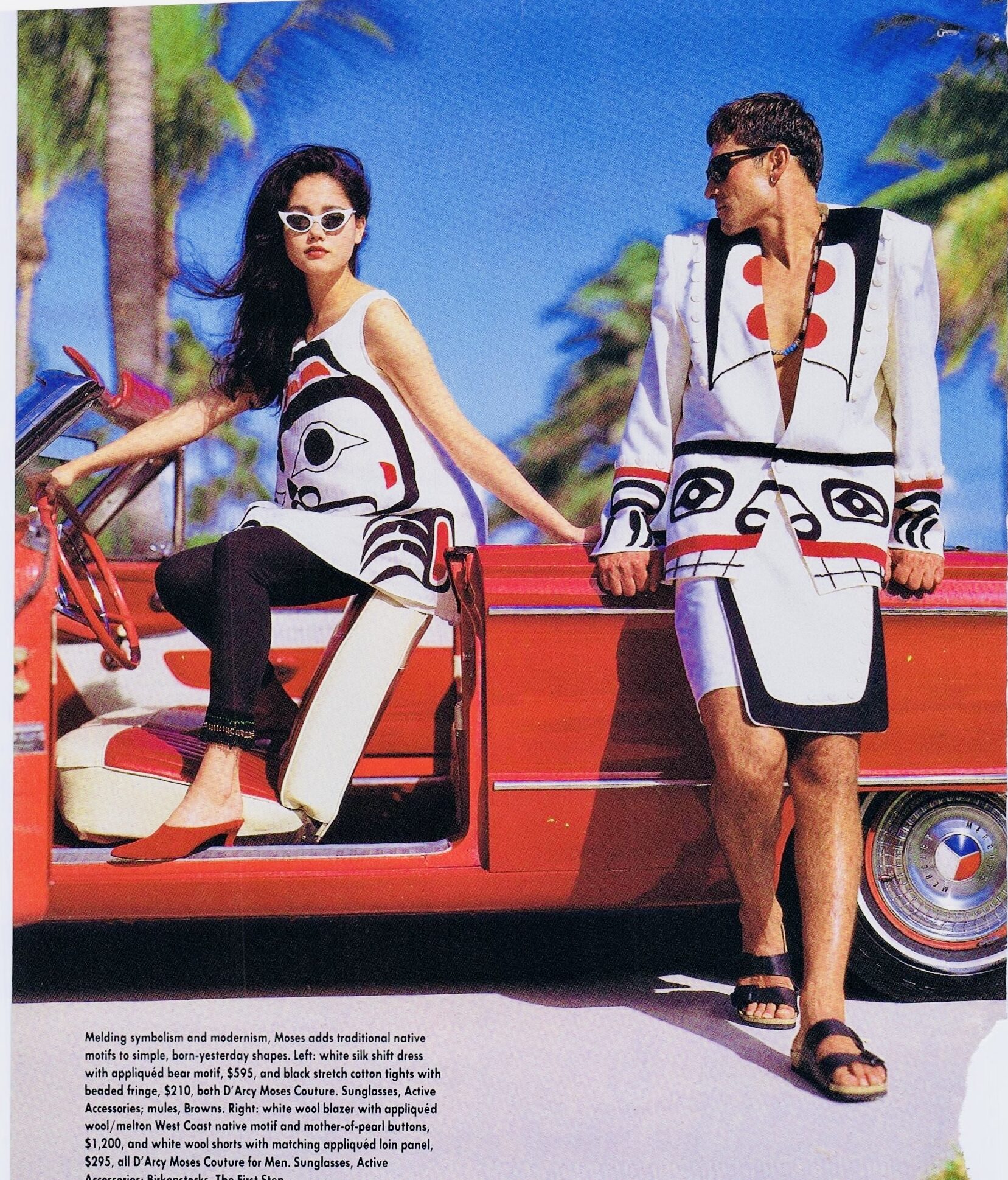 Editorial photograph of D'Arcy Moses Couture: white silk and wool with formline motifs, a red convertible