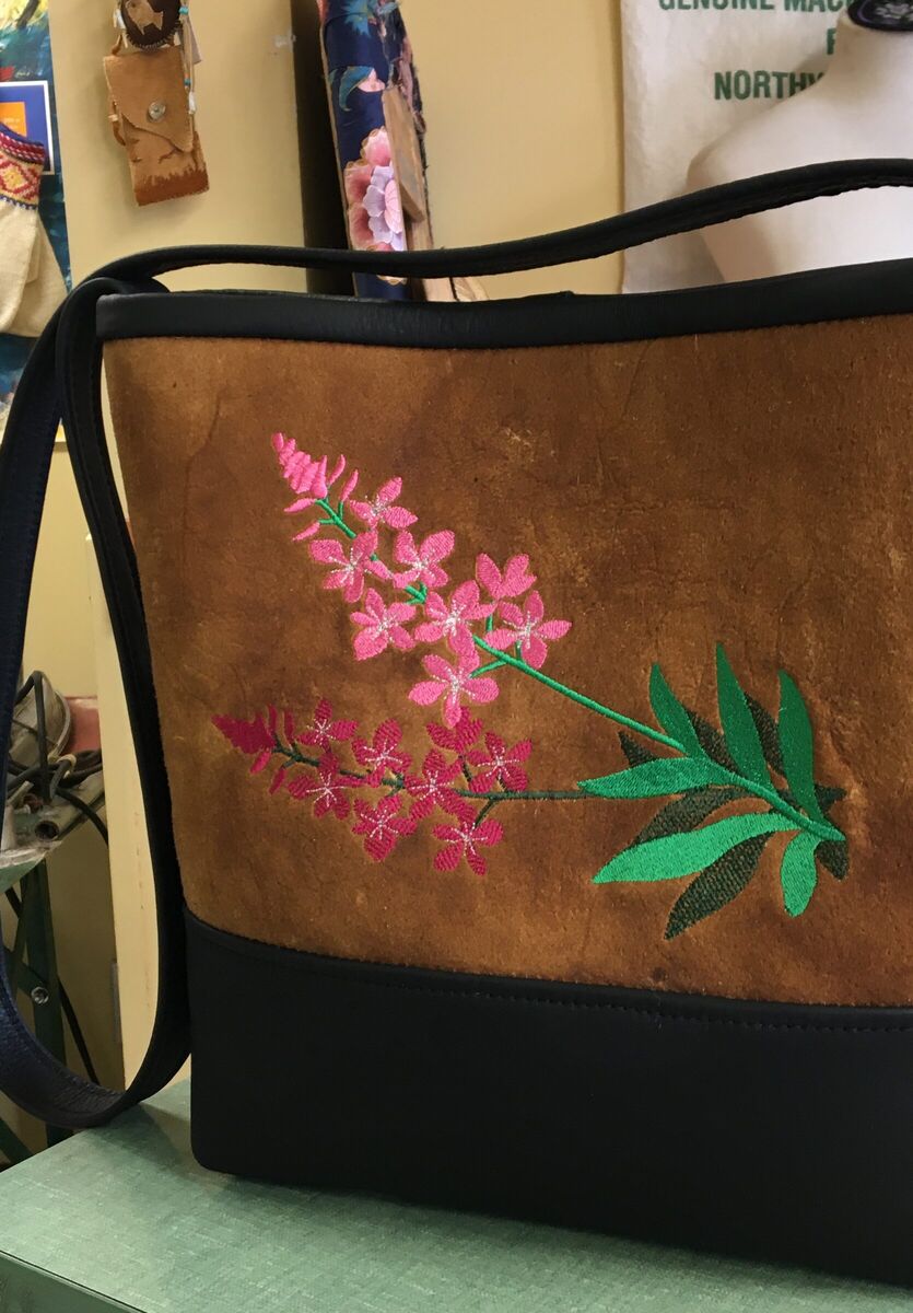 Tan hide bag with fireweed embroidery