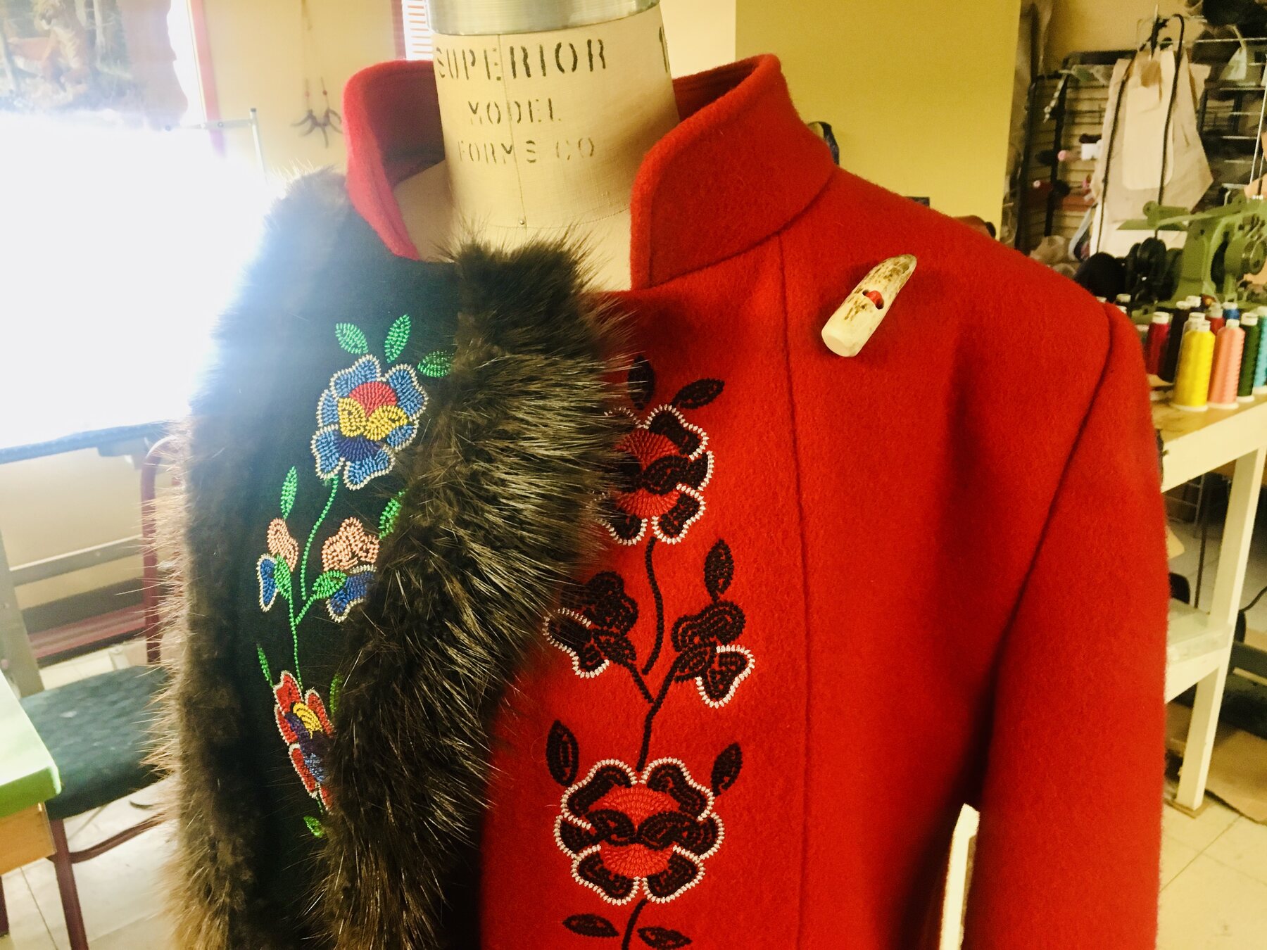 Fur collar and beaded florals on red wool